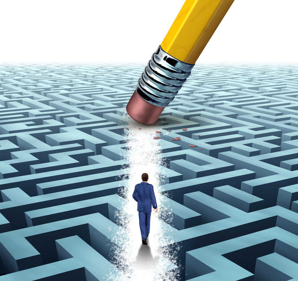 path of obstacles erased as man walks toward goal